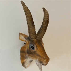 Wooden ibex head