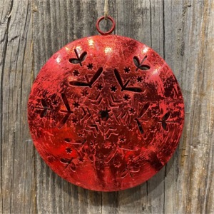Red ball with snowflakes to hang