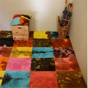Tapis en peau de vache multicolore