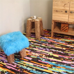Tapis en peau de vache multicolore