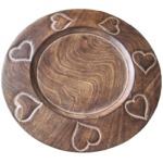 Charger plate in burnt wood with carved hearts