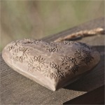 Coeur en bois sculpté edelweiss